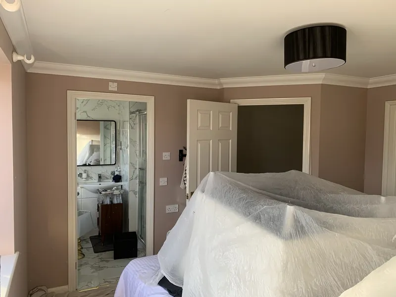 The en-suite and bedroom doors — after