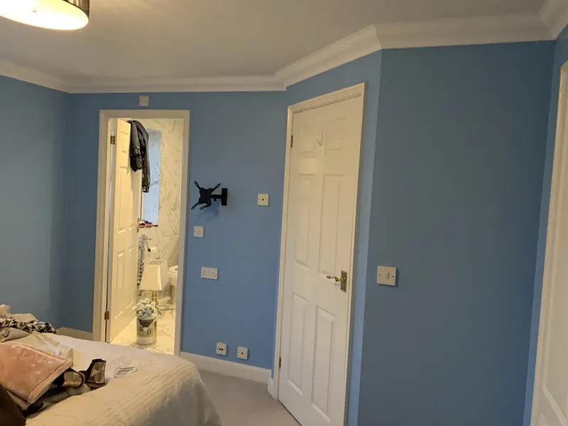 The en-suite and bedroom doors — before