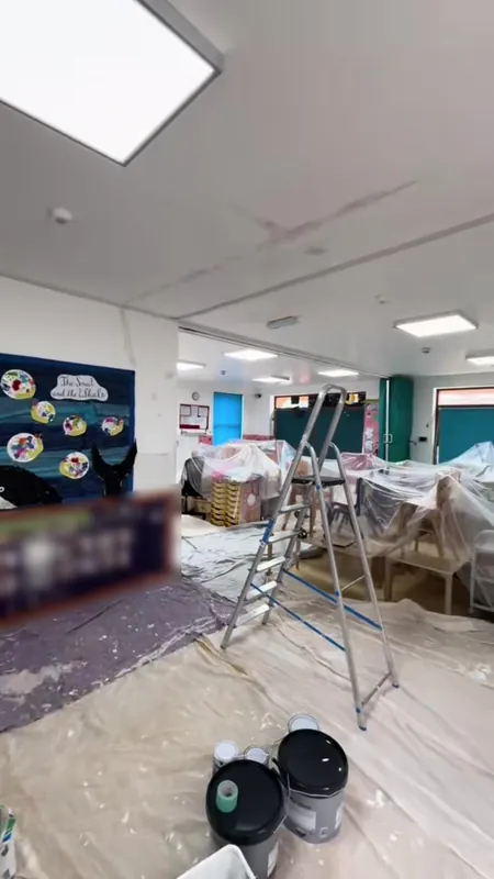 The main playroom: ceiling cracks repaired, ceilings and walls repainted — before