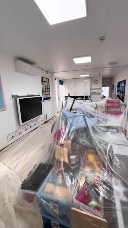 Toys, shelves and furniture wrapped and the floors sheeted before we started