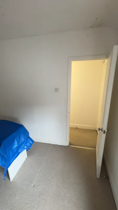 Looking to the door — before