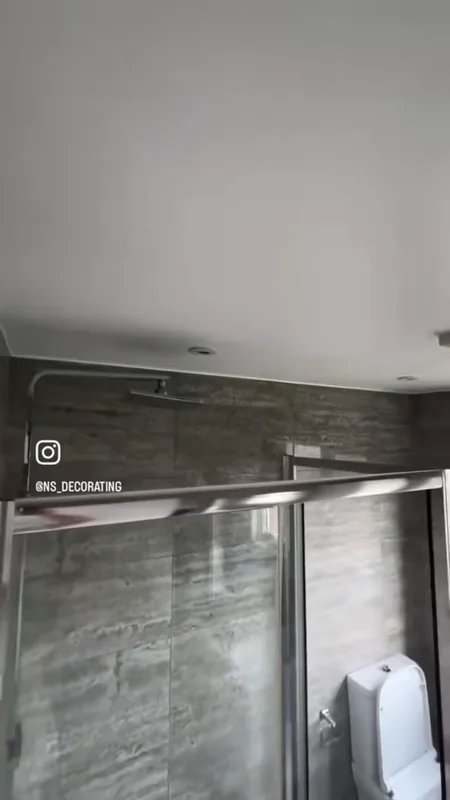 The ceiling over the shower: flaking paint, then the finished ceiling — after
