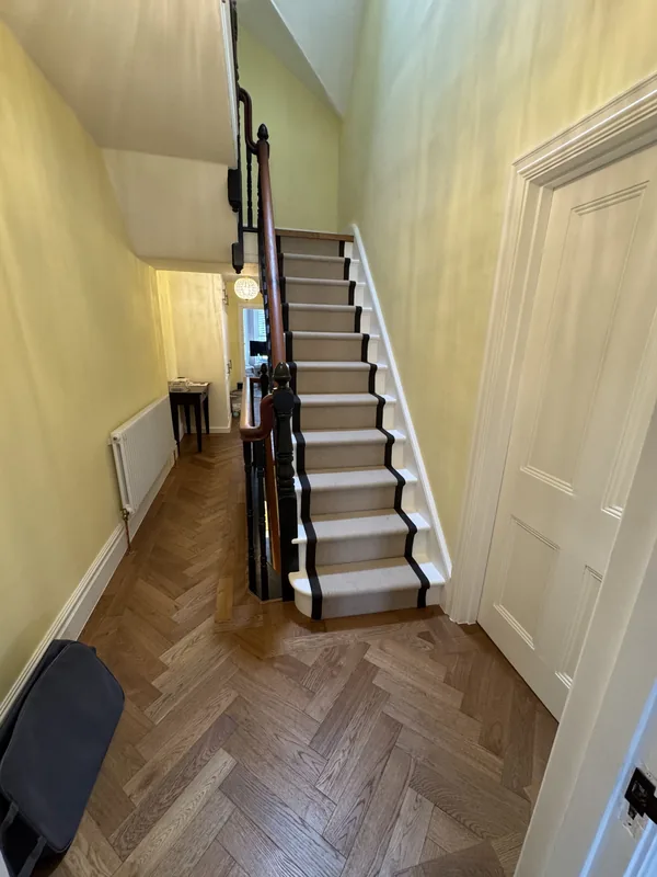Hallway and stairs to the first floor