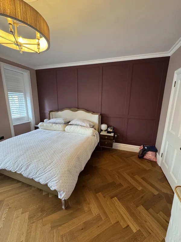 Panelled feature wall and herringbone floor