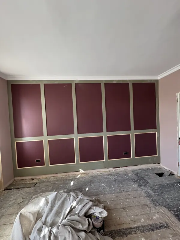 Panelled feature wall in the main bedroom — during