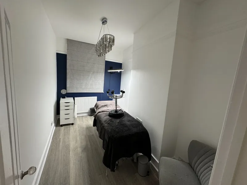 Laser room with navy feature wall