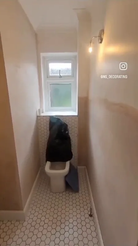 From the door: fresh plaster, then the finished room with its navy coving and woodwork — before