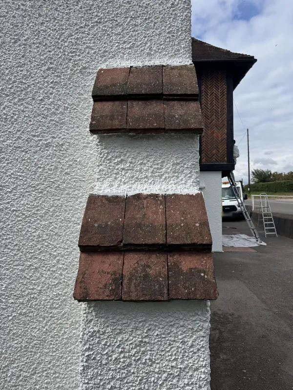 Pebble dash done, tiles next