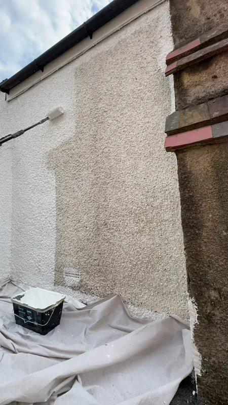 Rolling the pebble dash, old finish on the left
