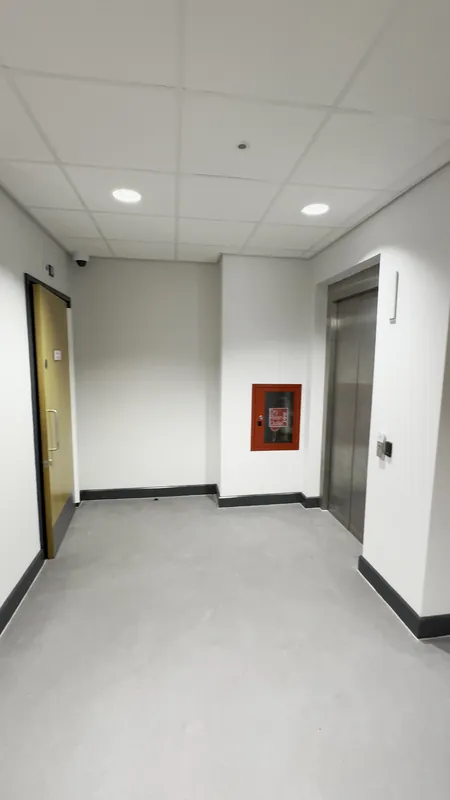 Ground-floor corridor by the lift