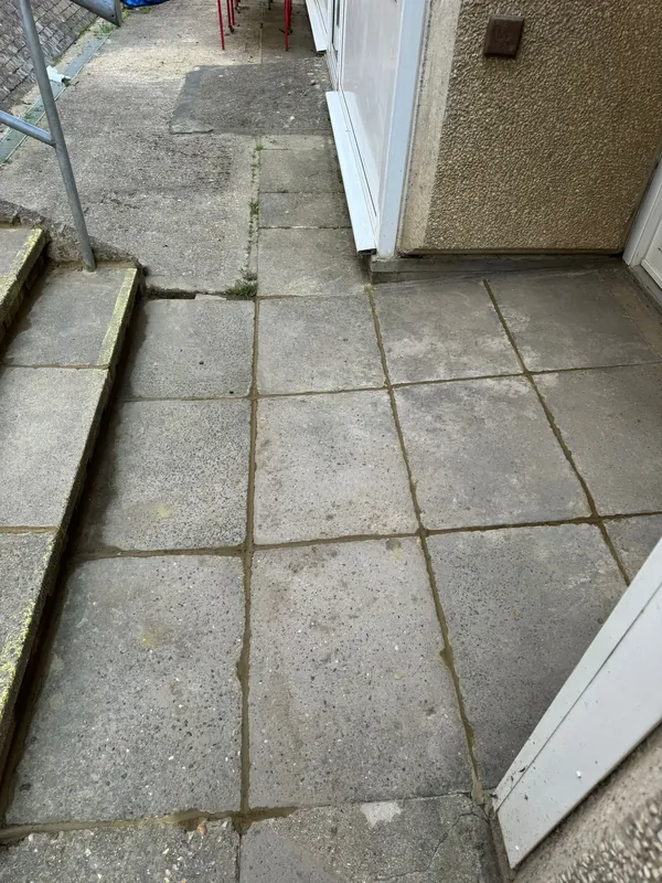 Paving by the classroom doors repointed