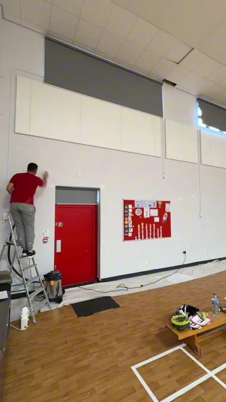 Return visit: filling the dents and damage in the sports hall wall
