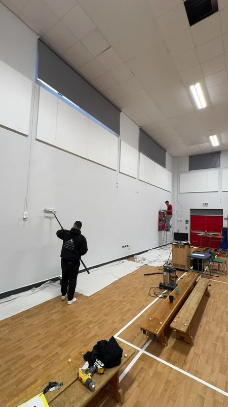 Rolling the sports hall walls