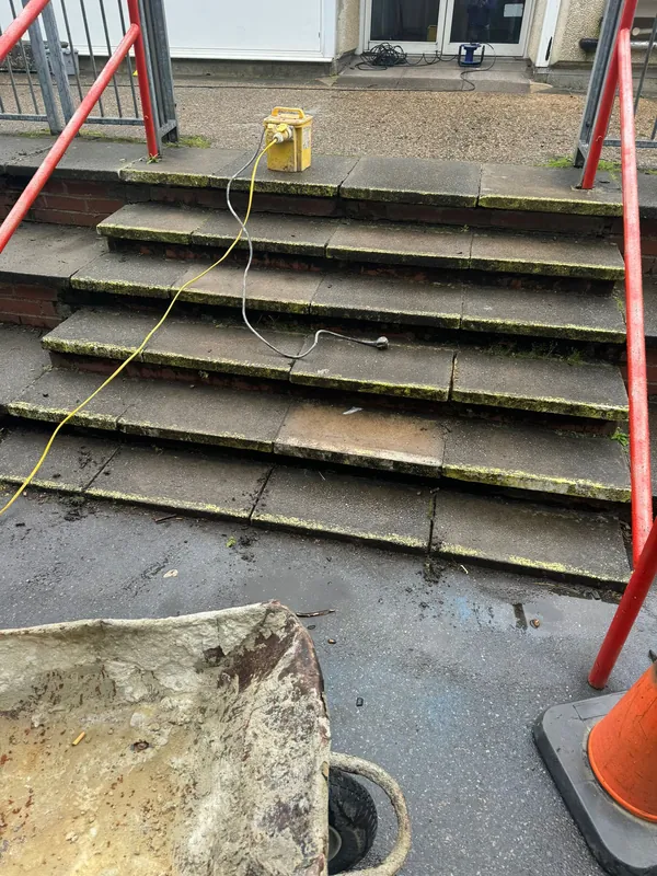 Steps to the main doors, every joint repointed — before