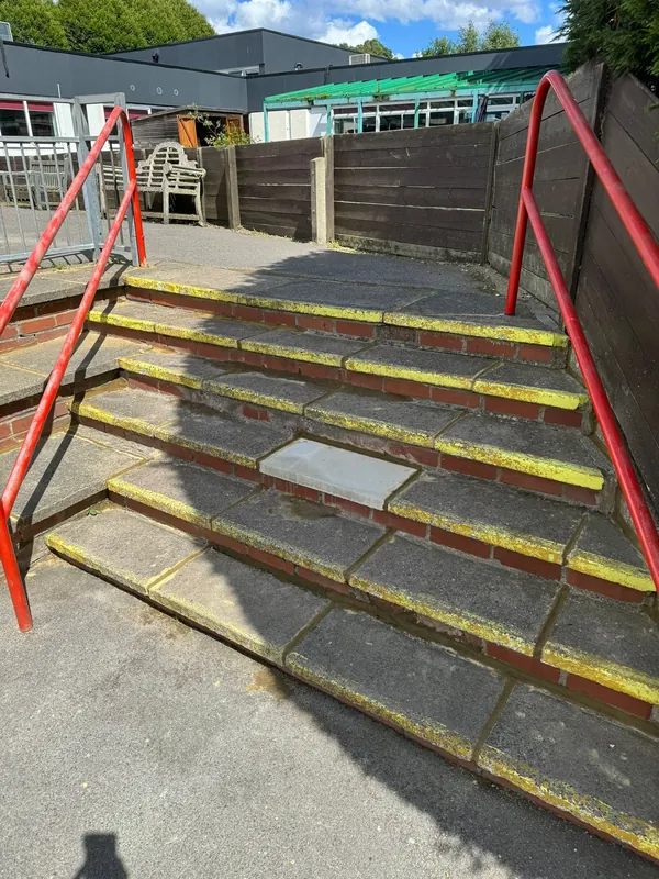 A broken slab replaced on the outdoor steps
