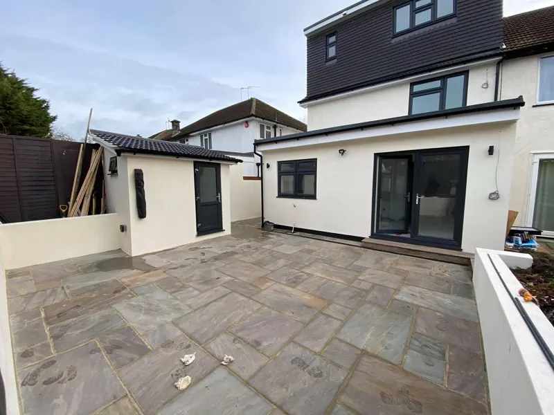 Patio with the shed and rear extension