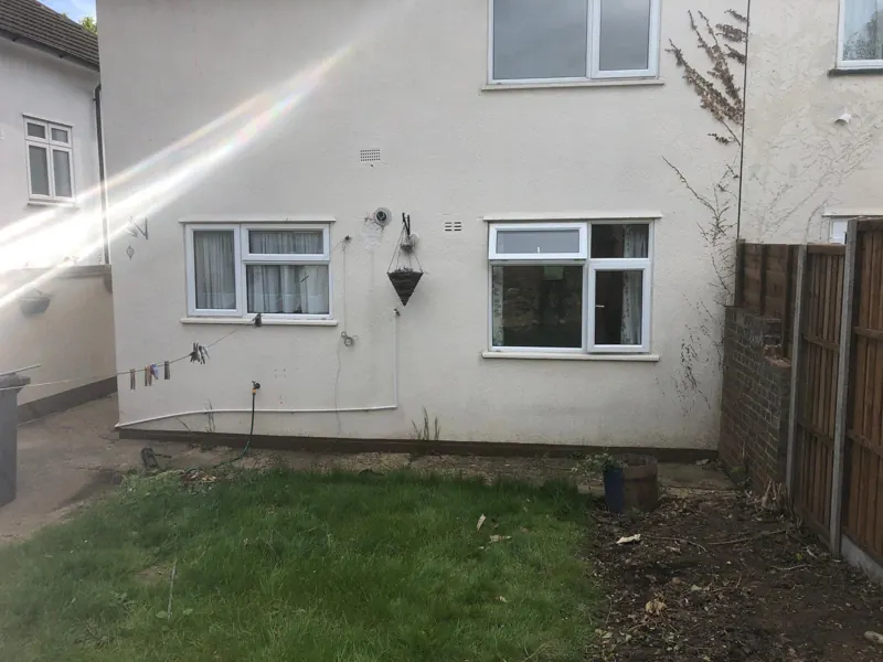Rear: new extension and dormer loft conversion — before