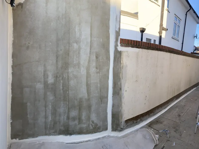 Side return walls rendered and painted — before
