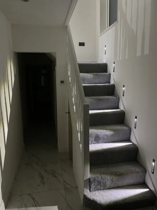 Staircase with step lights in Edgware