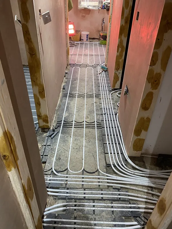 Underfloor heating being laid