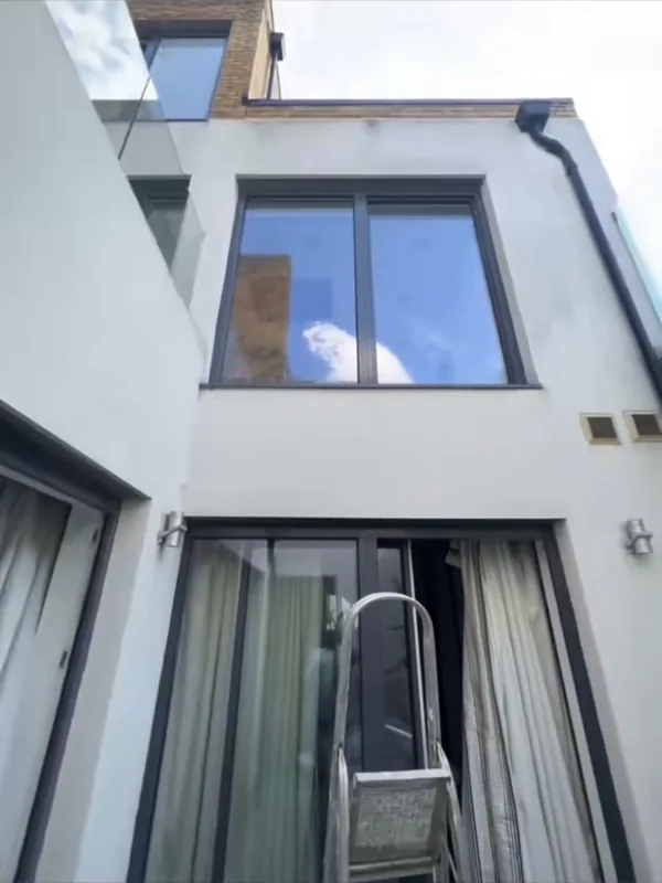 The courtyard, looking up at the back of the house — before