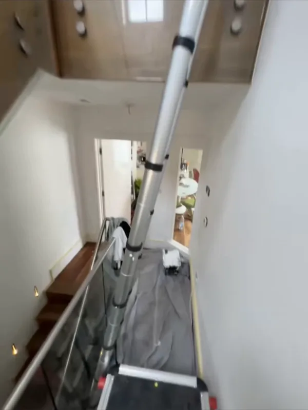 The stairwell covered and set up with ladders