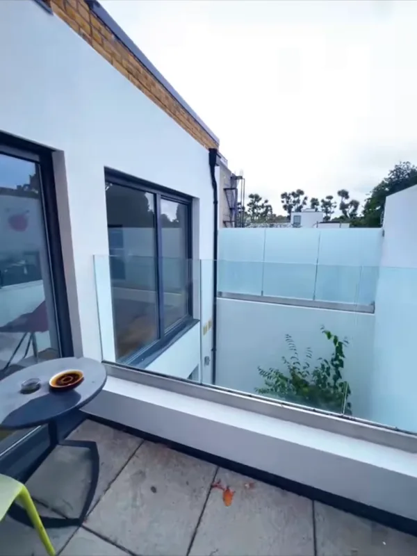 The terrace outside the sliding doors — after