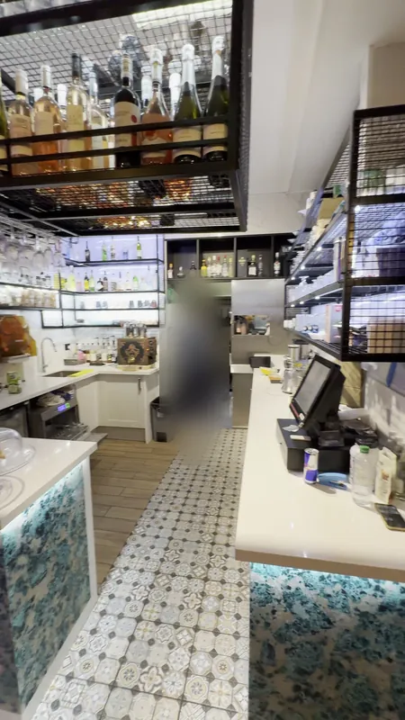 The bar: rebuilt with a new counter and shelving — after