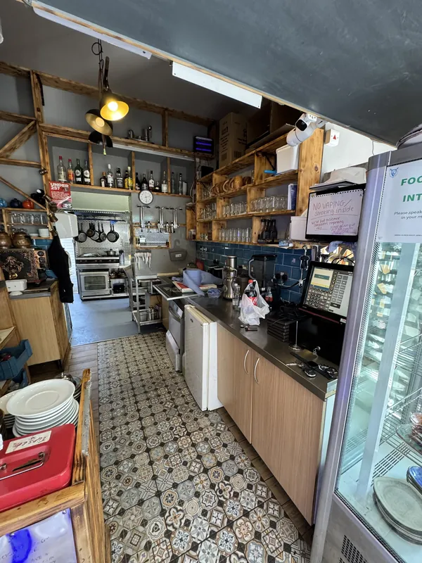 The bar: rebuilt with a new counter and shelving — before