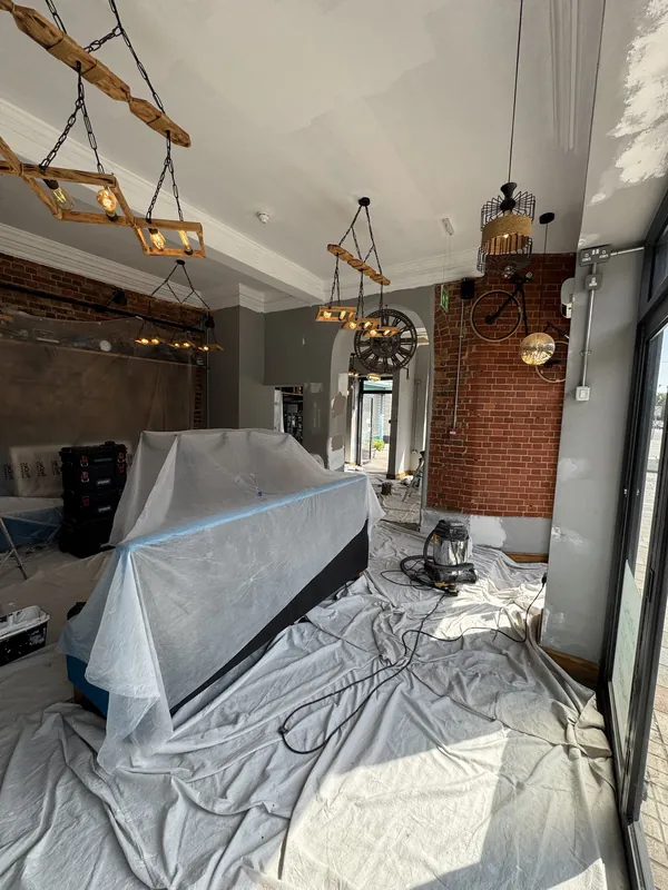 Everything sheeted up for painting