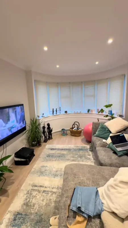 The living room bay, after the room was opened up — after