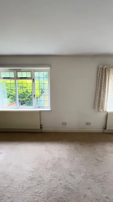 Bedroom: wallpaper gone, every surface repaired and painted — before