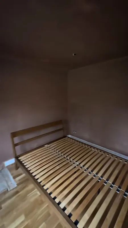 The bed wall, with new panelling — before