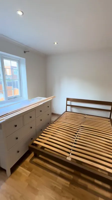 The window wall, before and after — after