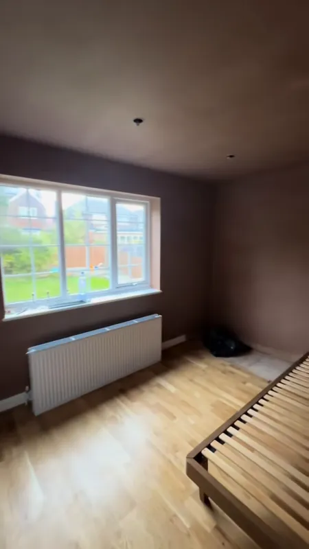 The window wall, before and after — before