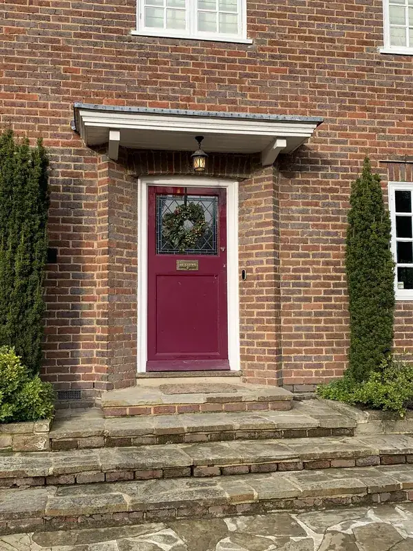 The front door: deep red to dark navy — before