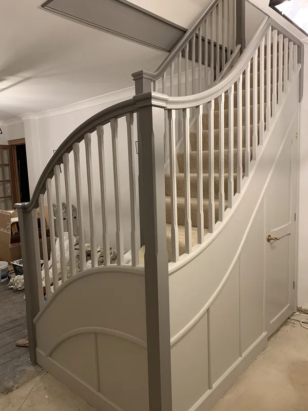 The finished staircase and cupboard