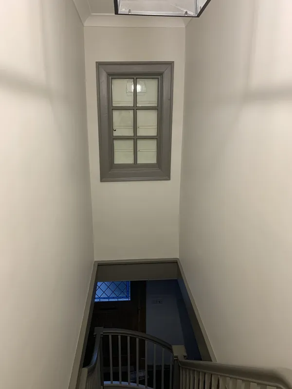 The stairwell window frame — after
