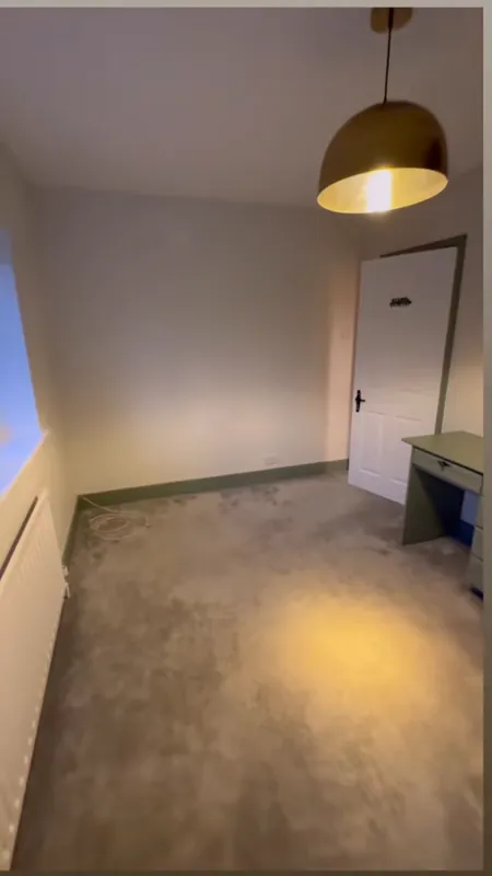 The door side of the room — after