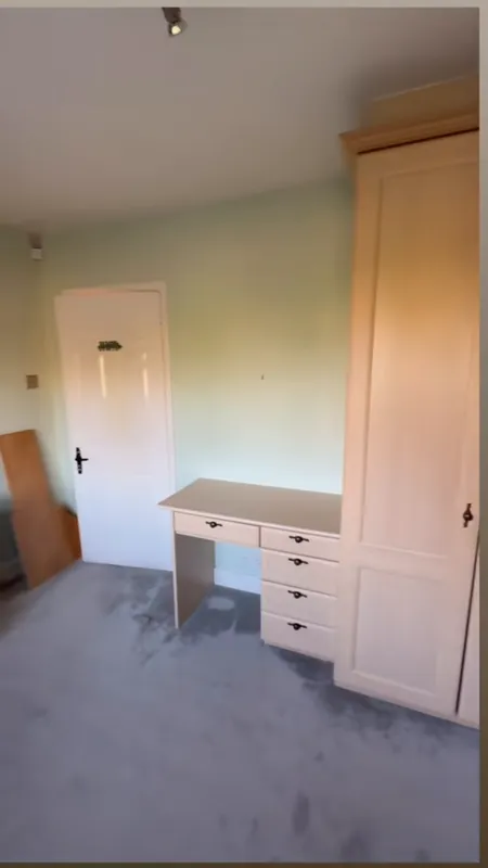 The door side of the room — before