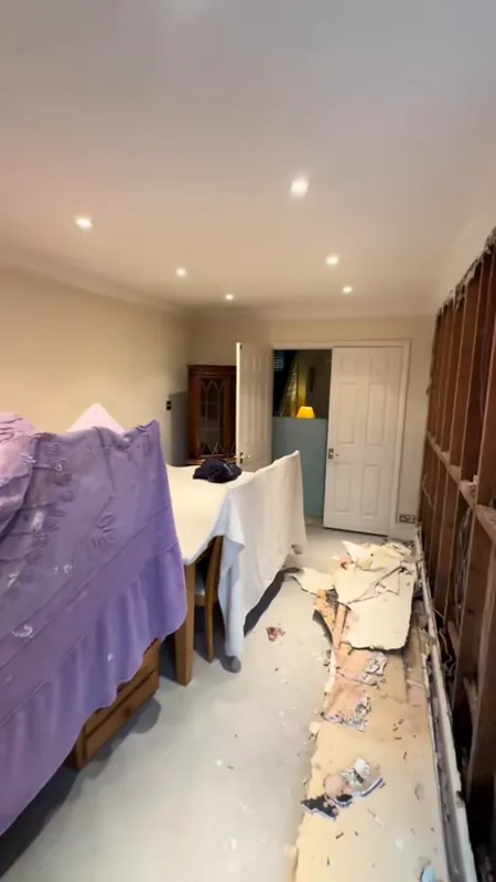 Furniture covered up while the wall was repaired
