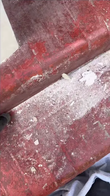 Scraping the old paint off the steps