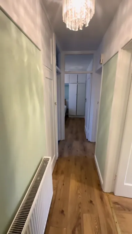 The hallway, looking through the flat — after