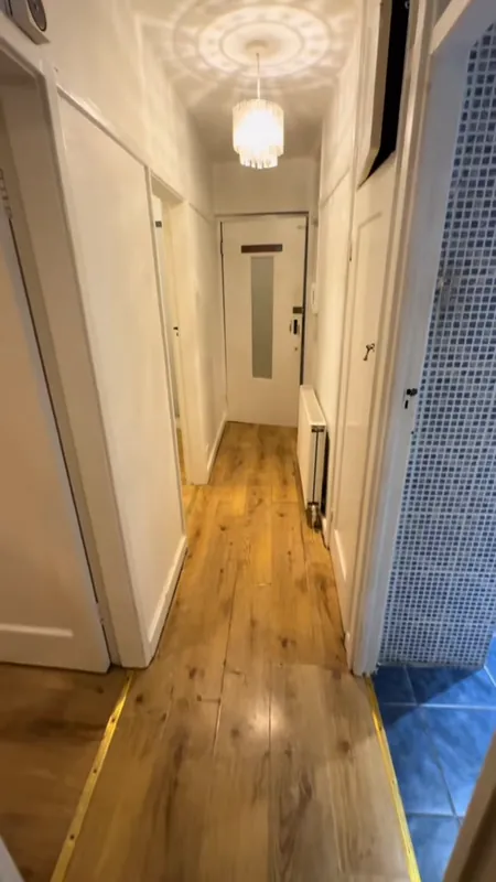 The hallway, looking through the flat — before