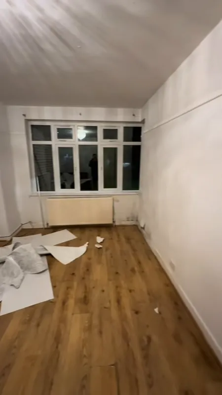 Old wallpaper stripped before the repairs