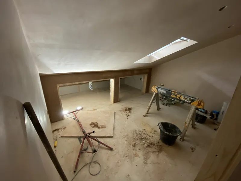 Loft plastered under the roof window
