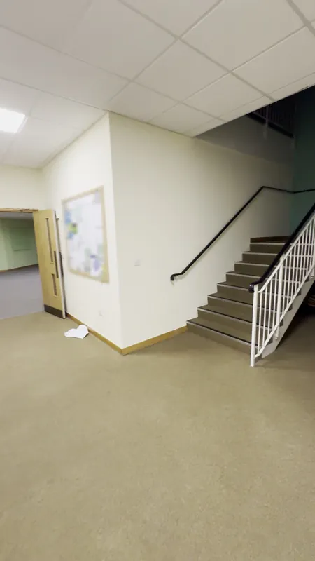 Ground-floor hallway leading to the stairs
