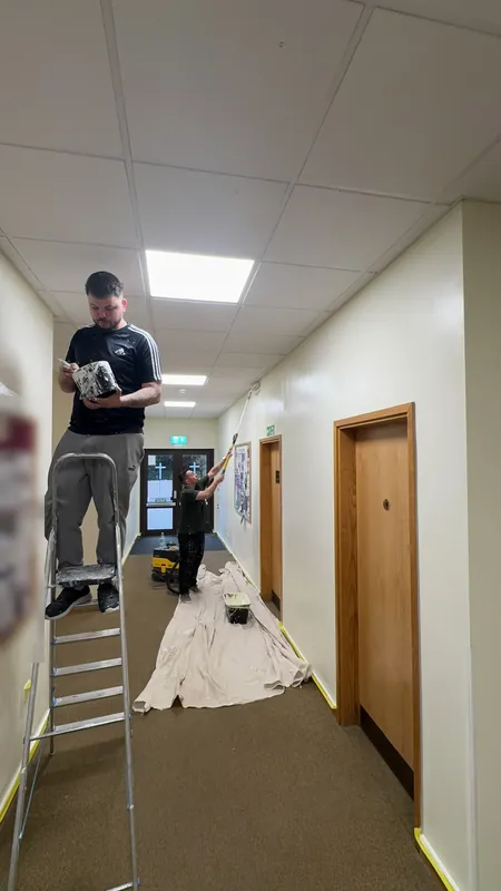Working along the ground-floor hallway