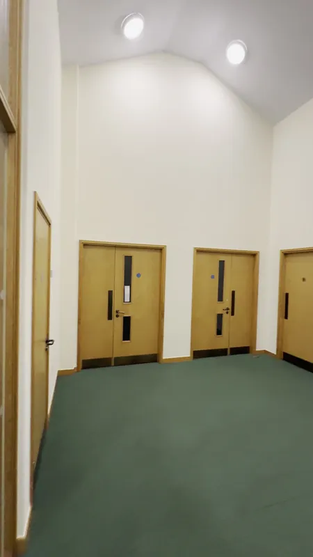 The first-floor landing, walls and ceiling repainted — after