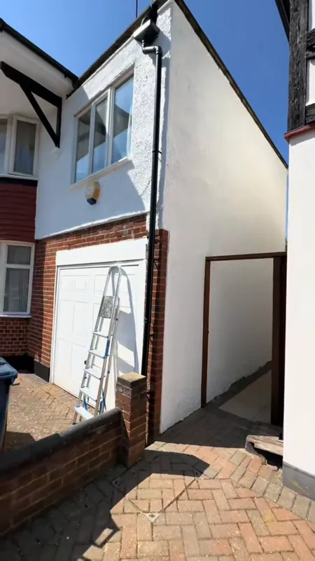 The side wall: cracks repaired and repainted — after